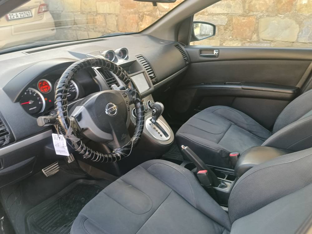 نيسان سينترا موودل2011بوو فروشتن اتووماتيك گيرله سه ر سووكان ته بريد سلايد شاشه كاميره مه ركه زي كنتروول كيروو مه كينه ي به شه رت فه حسوو سه نه وي ره قه مي تازه تا2029 عام بووياخ ده عمي قوورسي نييه سعري68كه لا كه ميك معا مه له زم *********** السليمانية, العراق
