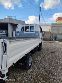 كيا حمل بزون كص قلاب حرف Tتي 2003 جاهزة محرك كير اكسن دوشمه تواير باتر...