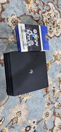 بلي ستيشن ٤ برو مهكر • ١تيرا • ١٠ العاب