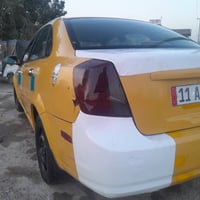 فورنزة 2008  رقم بغداد دولي مكينة وكير اوتوماتيك بالجيس  السيارة جاهزة...