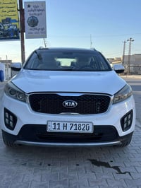 كيا سورنتو 2018 رقم بغداد لون ابيض  6سلندر   7راكب  بصمه  داخل كريمي ف...