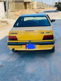 بيجو ٤٠٥ سنويه  ل٢٩ رقم بغداد الماني معاملة تحويل انكيلزي جاهزة  مكفول...