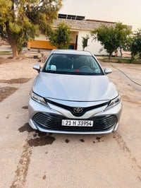 كامري للبيع  موديل 2019 كلين ماشيه 86 ميل  گير محرك شرط صدر تايرات شرط...