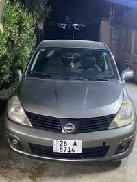 نيسان فيرسا موديل ٢٠٠٩   محرك كير شرط تبريد شغال صدر زين  رقم صلاح دين...