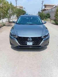 نيسان سنتره موديل ٢٠٢٤ بدون أرقام ضرر موضح بل صور قطعتين صبغ  جاملوغ خ...