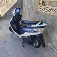 دراجة • شغال • نجف