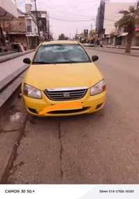 سبكترا ٢٠٠٦ • محرك ٢٠٠٠ • فتحة سقف