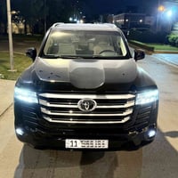 لاندكروز 2022 ساز  GXR تنفس طبيعي  رقم بغداد باسمي  ماشيه 54 الف  مغلف...