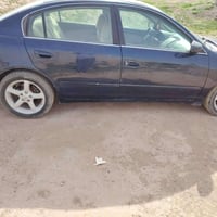 نيسان التما موديل 2005 رقم بغداد سياره خير من الله السعر خاص 077199121...