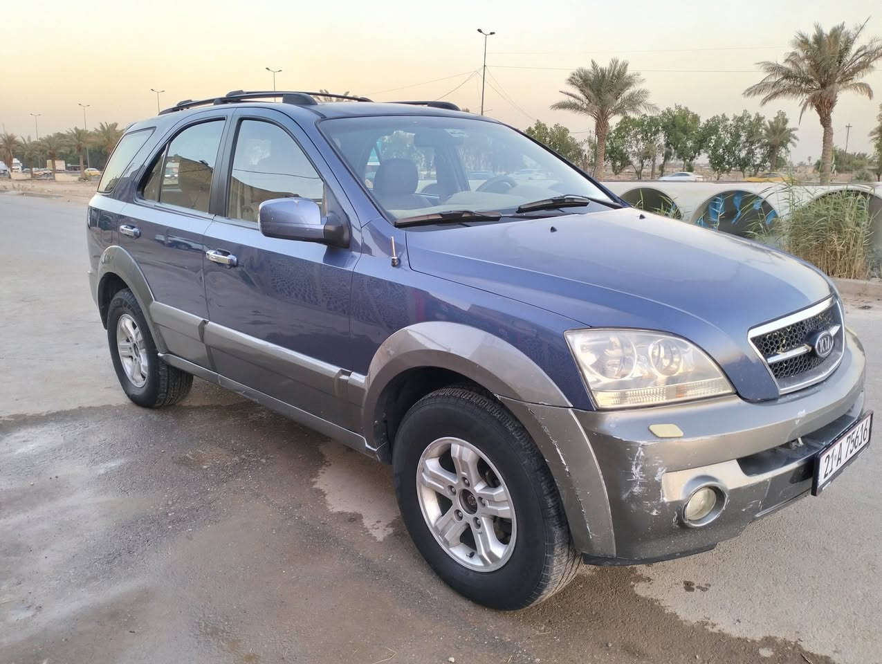 السلام عليكم عندي كيا سورنتو للبيع موديل 2005 خليجي فول مواصفات فتحة تحكم ستيرن فور ويل  مكفولة من الضربة والصبغ مكينة ستة سلندر 3500 كير اوتماتيك تبريد شغال صدر امامي وخلفي تخم تاير رقم سليمانية دولي هزة جديدة سنوية باسمي لغاية 2028 مكان السيارة بغداد الهاتف ***********
