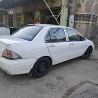 لانسر • ٢٠١٠ • ضربة خلفية