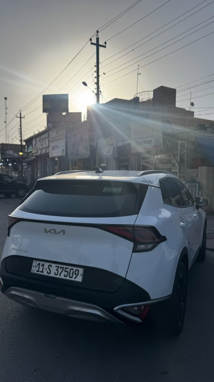 السلام عليكم 
كيا سبورتج ٢٠٢٣  خليجي ضمان دوليه
بيه بارد بسيط بين البيبان مسحوب كارت
ماشيه٧٣ الف كيلو حقيقي 
رقم بغداد انكليزي الجديد  بأسمي 
* داخل بيجي
* سعة المحرك 2.0L
* ويل كب ١٩
* تشغيل عن بعد
* حساسات أمامية + خلفية
* شحن واير ليس
* هاند بريك بصمه
 * بصمه عدد ٢
* مري شفط + اشارة
* منافذ شحن للمقاعد
* تبريد بيانو قطعتين (منفصل)
* كراسي كهرباء+تدفئه كشنات + تدفئه استيرن  
* لد ترحيب
* اوتو هولد
* شاشه كبيره
* نضام نزول منحدرات
* مانع انزلاق
* تحكمات ستيرن
 * كامره خلفيه دواره 
* ماسحه خلفيه
* بصمة دخول 
* حساس مطر
* السعر215 وبيها مجال بسيط حك الجيه 
* مكان السياره كربلاء حي النصر
للاتصال /***********
