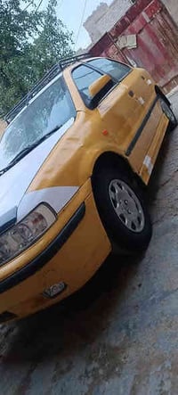 سمند مديل 2010 رقم بغداد تحويل مباشر   محرك وكير وتايرت كهربايت كله  خ...