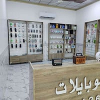 غراض موبايلات محل كامل للبيع كلشي موجود سعر مناسب سعر جمله رفوف محل مي...