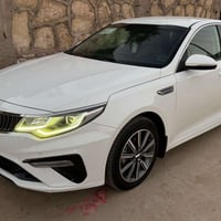 أوبتيما ٢٠١٩ خليجي مكفوله سياره جديده رقم بغداد ماشيه ٩٩ بسمي محرك ٢٠٠...