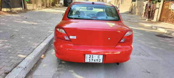 السلام عليكم عندي كيا ريو للبيع موديل 2002 بيهة صبغ عام جمالية مكينة وكير مكفولات تبريد شغال تخم تاير جديد رقم سليمانية جديد  هزة جديدة سنوية لغاية 2029مكان السيارة بغداد السعر 55 $ الهاتف ***********
