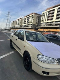 نيسان صني • ٢٠٠٦ • ابيض