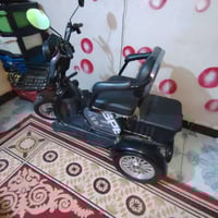 دراجة معاقين • كهربائية