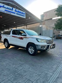 هايلوكس 2016 فور ويل  كير اوتوماتيك  نص باب بارد وصبغ  الجاملغ الامامي...