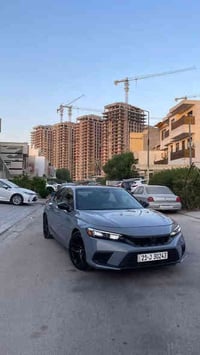 هوندا سيفيك 2024 ماشيه 27000 كيلو  فول عدا فتحة السكف والنقطة العمياء ...