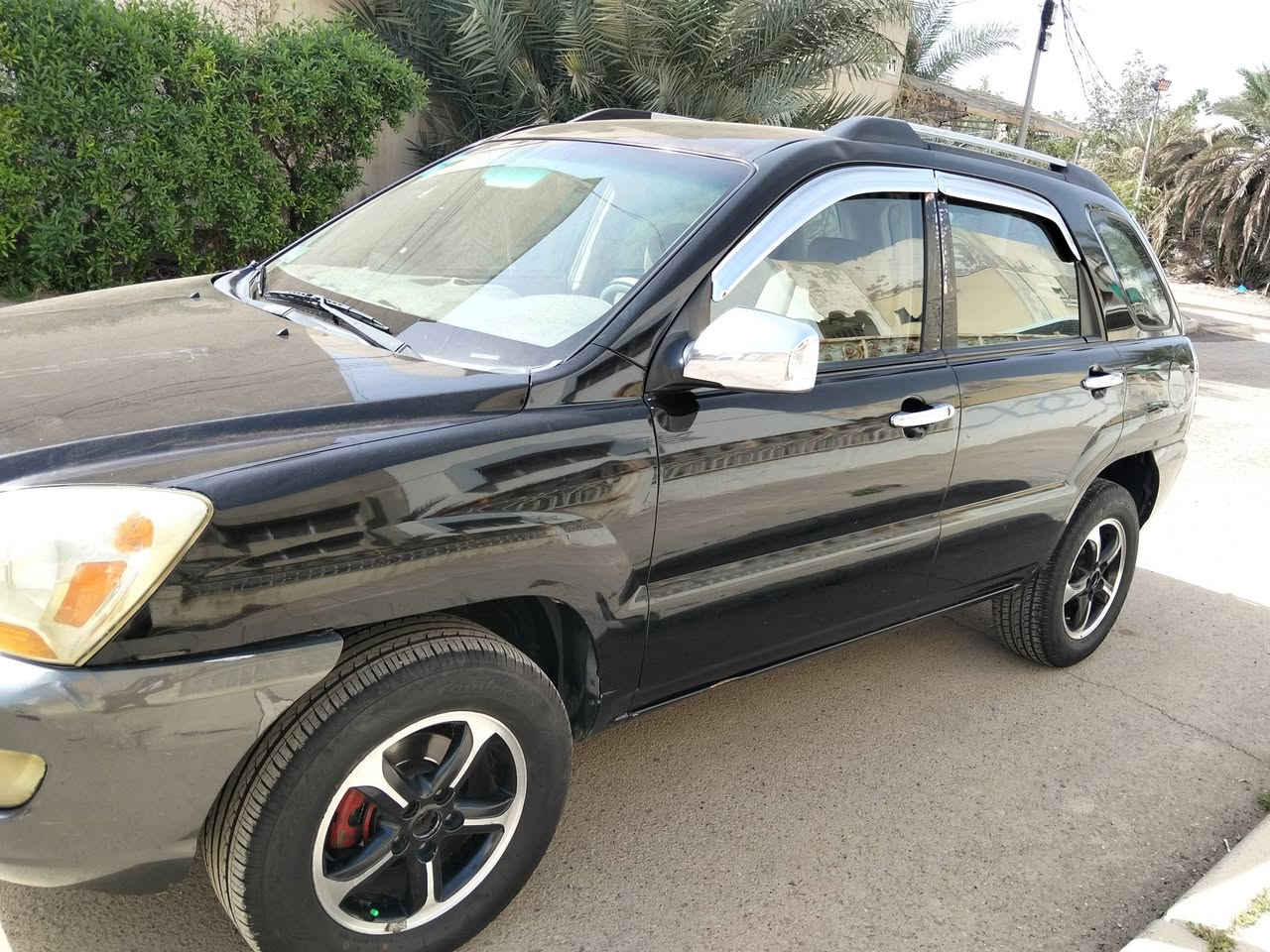 السلام عليكم سبورتج 2007 وارد امريكي محرك 2000رقم بغداد السعر 97مكان السيارة  ***********
