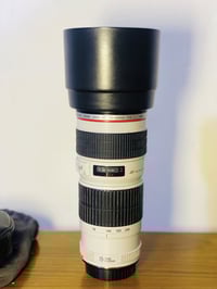 عدسه 70:200 العدسه بعدها جديده دبل سبلايزر فتحه 1:4 السعر ٤٠٠ 07727731...