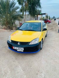 لانسر • ٢٠١٠ • مكينة ٢٠٠٠ اوتوماتيك