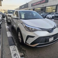 ايزو...CHR...وارد الصين موديل 2024 ...زيرووو... محرك 2000 هايبرد سلايد...