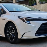 كورلا هايبرد شكل امريكي 24 فول مواصفات داخل احمر رقم بغداد  ماشيه 40 ا...