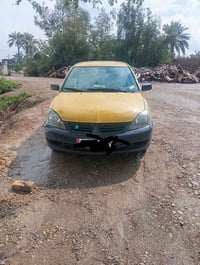 لانسر موديل 9 مصفرة هيئة وغرامات سيارة حلوة وبعد احلاى من صورة مكينة 1...