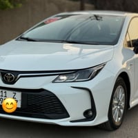 كورولا هايبرد 2025 خليجي رقم بغداد جديد باسمي مكفولة من الصبغ والتبديل...