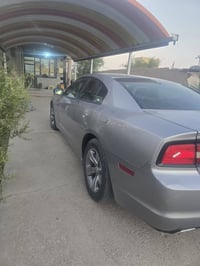 جارجر للبيع موديل ١٤ رقم بغداد  الضرر جاملغ خلفي بجم كبس  بيها ثلاث قط...