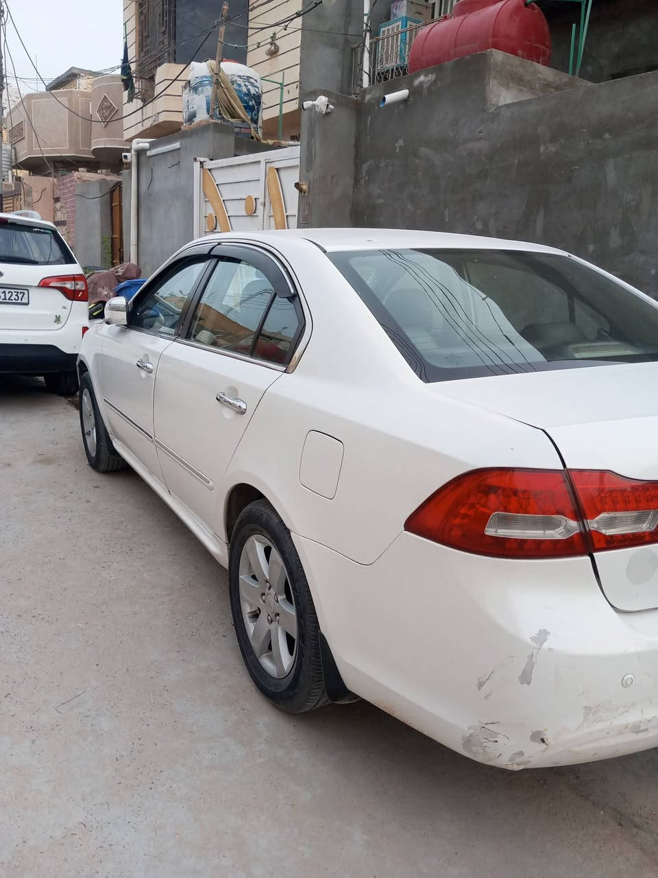 اوبتما للبيع لوتز موديل 10بيه حزام صبغ بيع مستعجل مكان سيارة كربلاء ***********
