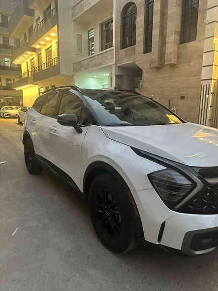 السلام عليكم 
كيا سبورتج 2024 x pro 

اعلى فئة بالسبورتج تجي ارتفاع اعلى من العادي  وحجم اكبر 

Two color لونين 

عليها تايرات Bf goodrich اصلي من الشركة

فول مواصفات 1/1

سقف بانوراما + فتحة 

محرك 2500 

كير 8 نمر 

رادارت امامي خلفي جانبي 

كامرات 4

سستم سماعات harman kardon

شاشه متصله 

كشنات تدفئة + تبريد 

خزن ميموري  + جلد 

وبعد هواي مواصفات بيهة 

اللون ابيض + اسود 

صندوك كهرباء 

وارد امريكي حادث امامي سطحي 

مبدل بنيد اصلي اصلي فقط والجاملغات بيهن بارد  مثل ماموضح بالتقرير مكفولة من اللغود والشواصي  

رقم بغداد تحويل مباشر 

ماشية 50,000 km  يعني بالميل 31,000 miles 

السعر : 23,000$ 

العنوان:  بغداد الاعظمية

***********
