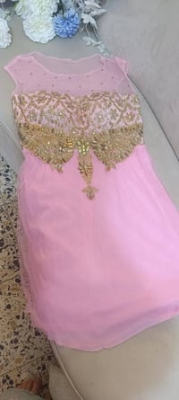 قطعة • ملابس