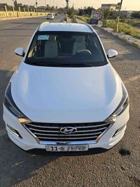 توسان موديل ٢٠٢١ رقم بغداد عداد ٧٠ حقيقي قابل للزياده استخدام البيت فق...