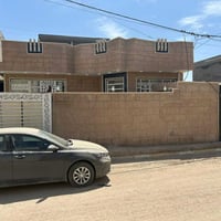 عندي بيت للبيع مساحه 200 متر مكان منطقة بغداد بيت  يحتوي من صاله واستق...