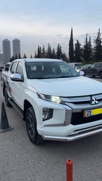 ميتسوبيشي ل200 • ٢٠٢٣ • ٥٦٠٠٠ كم
