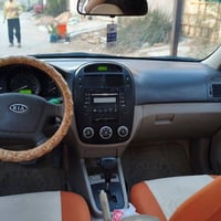 سيراتو 2009  بيه الجاملغ الأمامي مال العبري مبدل بلادي نفس لون السياره...