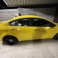 كيا فورتي موديل 2014  السياره نص فول  تحكمات ستيرن  و مري شفط  و اشاير...