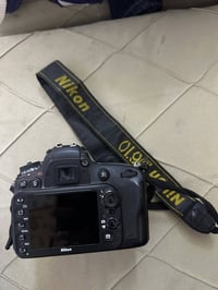 نيكون 610 • عدسة 70/300 • عدسة 50مم