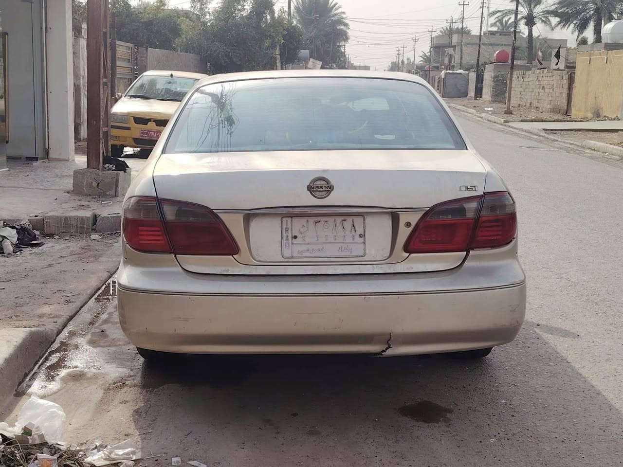 نيسان مكزمه موديل 2000مصبوغة جماليه مدون ضربه السعر 38مكاني بغداد المعامل الرقم ***********
