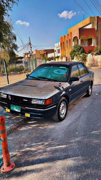 مازدا 323 • ١٩٩١ • كويسينجاك