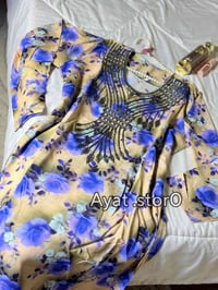 ملابس • مقاسات L/XL • صورة زبونة