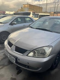 لانسر • مكينة كبيرة • مكيف