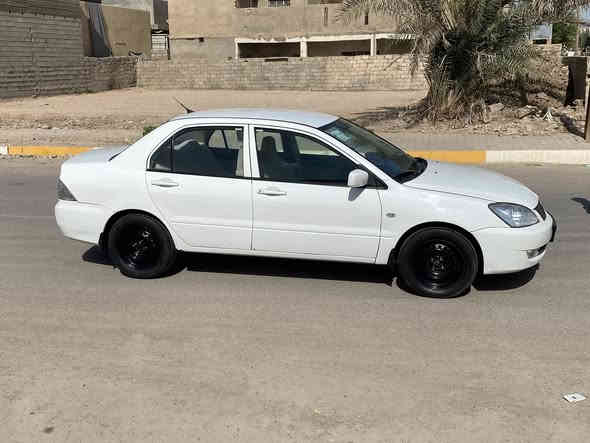 السلام عليكم لانسر 2011 رقم بغداد كير محرك صدر تخم تاير جديد  السياره جاهزه سنويه 30 تبريد تدفئه شغال  السونار مرفق بلمنشور السعر 86 وبيه مجال قليل الرقم ***********
