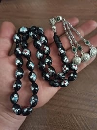مسبحه من خشب النارجيل المصري ثلث  مطعم بالقلاي والمينا بسعر 25 الف واص...