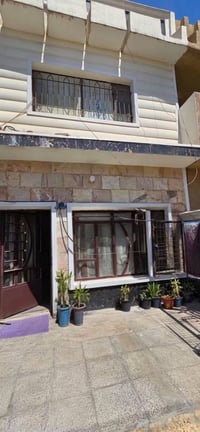 بيت ١٠٠ م في الدورة ابو دشير طابوا صرف طابقين يحتوي الطابق الاول على ص...