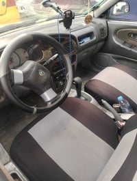 بروتون للبيع 2004 اتوماتيك محرك جديد مال كصه  . بيها طخة بل چاملغ الخل...