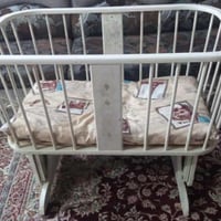 سرير اطفال • هزاز